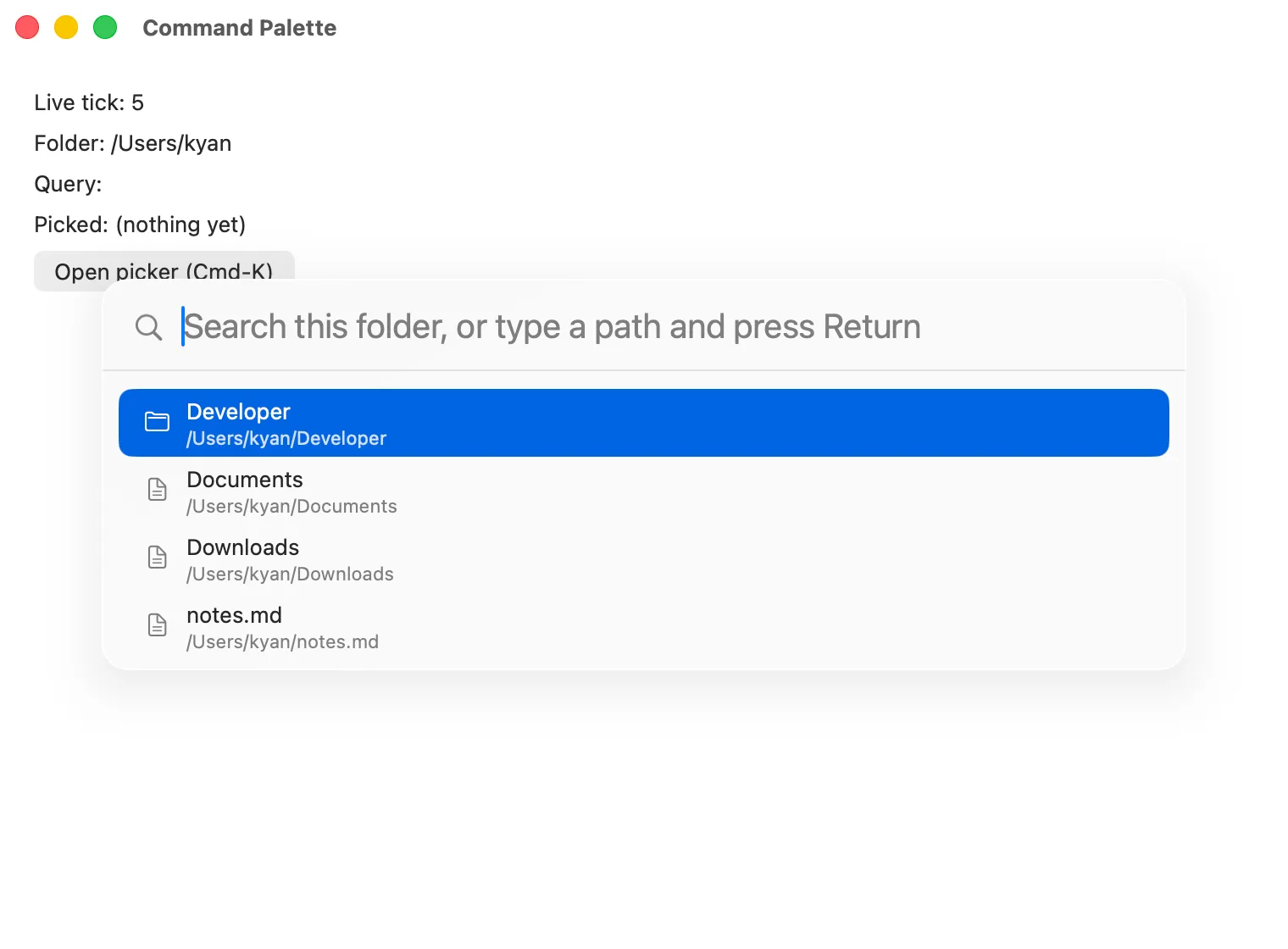 The command palette open over the demo app on macOS (AppKit)